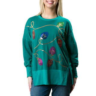 Green sweatshirt with sequin holiday lights