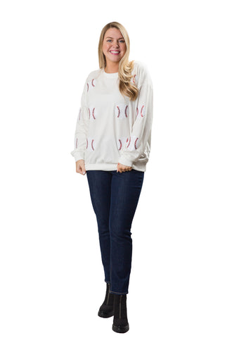 White sweatshirt top with sequin baseballs