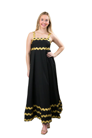 black dress tiered dress with gold rick rack details