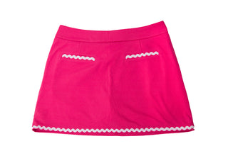 Pink skort with white rickrack ribbon on hem and back pockets