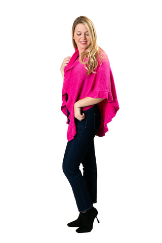 woman wearing metallic ruffle wrap in magenta