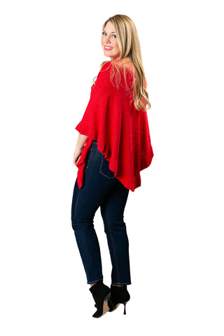 woman wearing metallic ruffle wrap in red