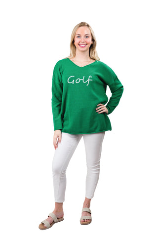 Woman wearing a green 'Golf' shirt on a white background