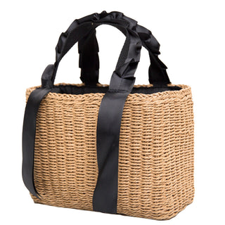 Woven natural straw handbag with black ribbon handles