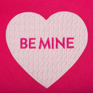 Hot Pink One Size Poncho with cable knit BE MINE heart, close up