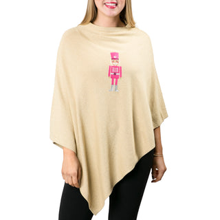 Metallic gold poncho with pink and silver nutcracker