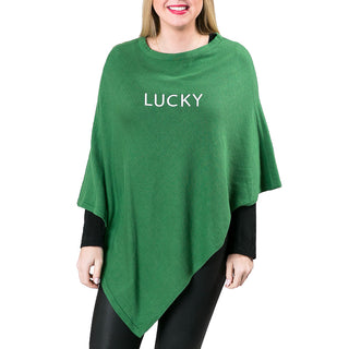 green knit poncho shawl with LUCKY in white embroidery