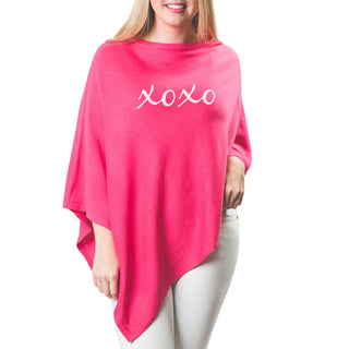 xoxo in white embroidered script letters on medium pink knit poncho shawl