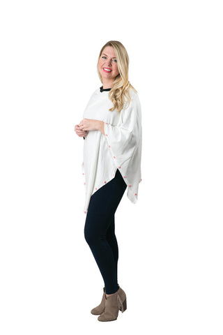 white poncho with peppermint candy button trim