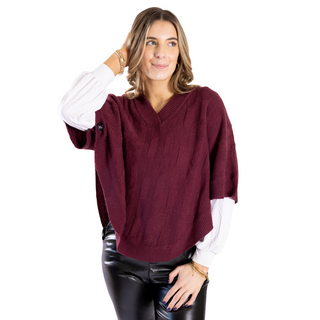 Bordeaux cable knit capelet with button sleeve closure
