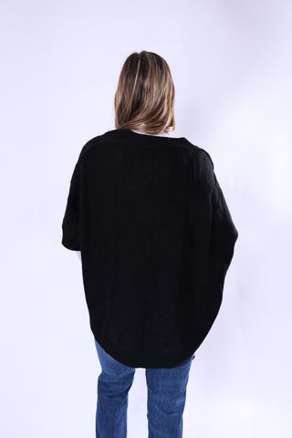 Black McKenna Capelet in cable knit, perfect for layering in fall, view of back