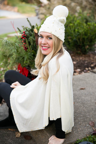 cream Carol Poncho with gold stud beads along the trim