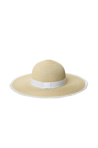 Natural wide brimmed hat with white ribbon on crown and white eyelash trim on brim