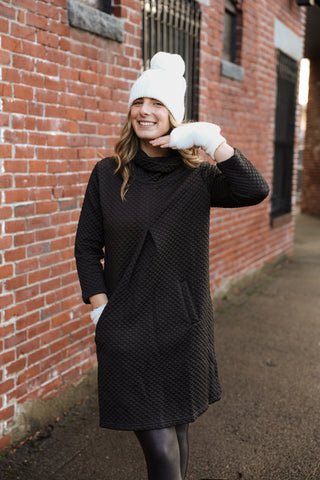 White faux fur fingerless gloves, black quilted dress