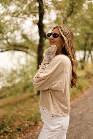 woman wearing White & Beige Plaid Glove – Lenore plaid glove in white with subtle pastel plaid for women’s fashion.