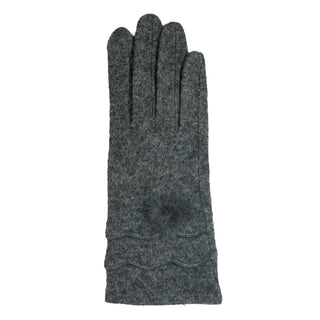Alt: Gray Cassidy winter glove featuring scallop edge detail, faux fur pom pom, and touchscreen fingertips