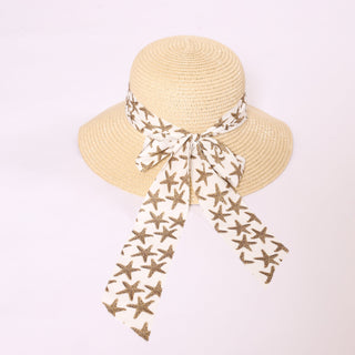 Brigitte Twillie Ribbon Hat featuring a white ribbon with gold starfish print bow