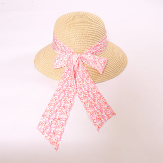 Brigitte Twillie Ribbon Hat with a pink coral-inspired ribbon bow detail.