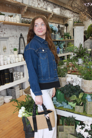 Dark wash denim jean jacket styled for spring
