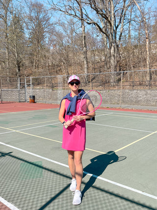Girl Wearing dress at tennis courts