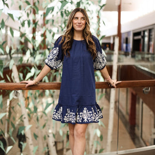 Women wearing blue and white dress