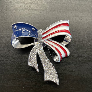 Silver bow brooch with American flag design