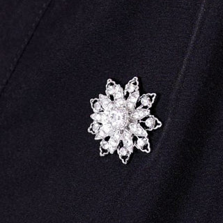 Silver decorative flower brooch with clear rhinestones