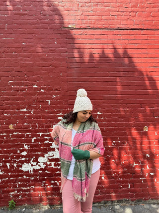 Pink and green scarf shown on model.