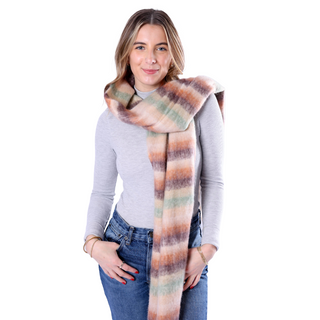 Woman wearing a colorful scarf on a white background