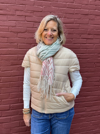 pink, gray and green chevron scarf with cap sleeve puffer vest in cream