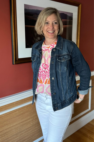 woman wearing Orange Cream and Pink Abstract Flutter Top