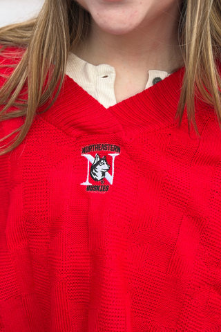 Red Mckenna Capelet with Northeastern University logo embroidered on 