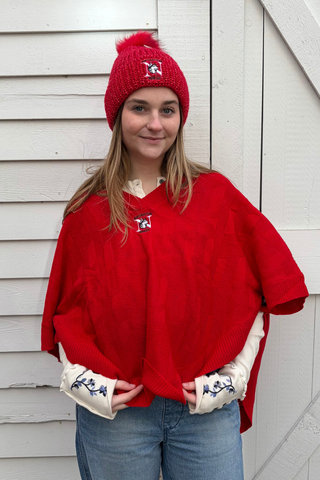 Red Mckenna Capelet with Northeastern University logo embroidered on 