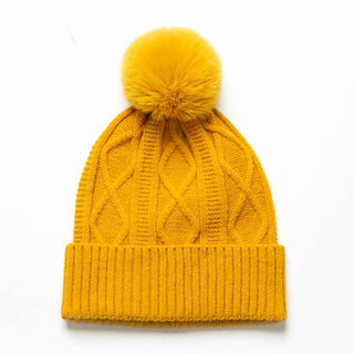 Mustard yellow Karen cable knit beanie hat with coordinating pom pom