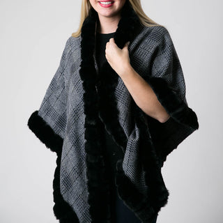 Black and gray plaid with black faux fur open wrap with hook for closure, front view