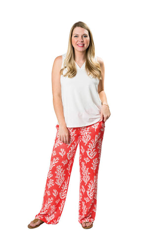 Orange with white coral print wide-legged palazzo pants with drawstring waist and two side pockets