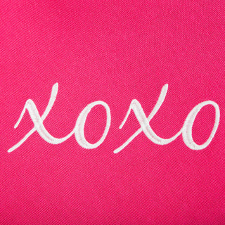 Pink One Size Poncho with white embroidered script XOXO, close up