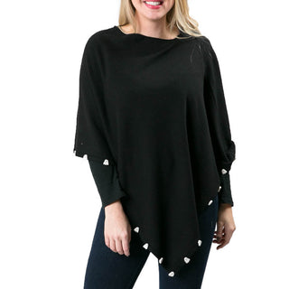 black poncho with white ghost button trim