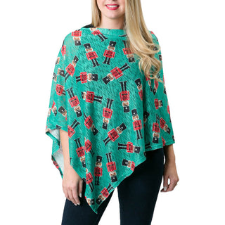 Emily poncho with nutcrackers printed on green