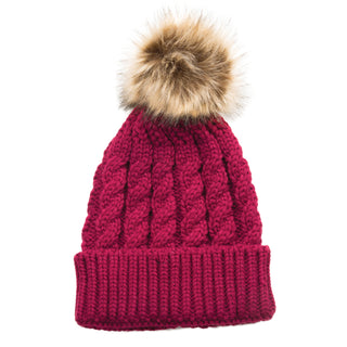 raspberry pink cable knit hat with faux fur pom pom