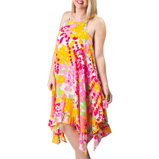 Pink and Orange Wildflowers printed dress with a ruffle asymmetric hem and spaghetti straps