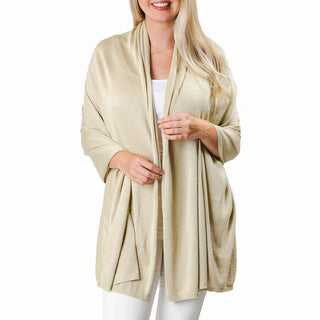 metallic gold bamboo shawl wrap with white jeans and top