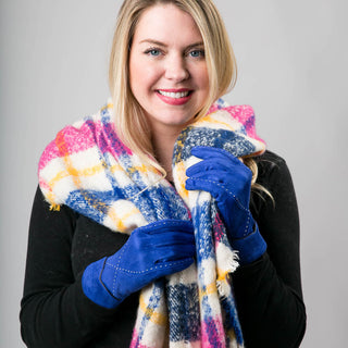 pink, blue, yellow and white plaid Indie blanket scarf with fringe with blue gloves